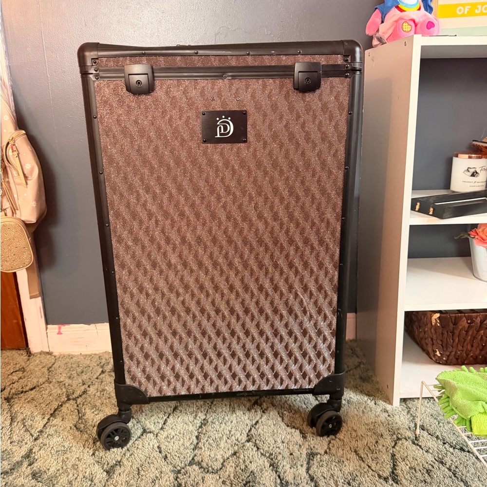 Diva Dolly rolling dance bag with rack and drawers.